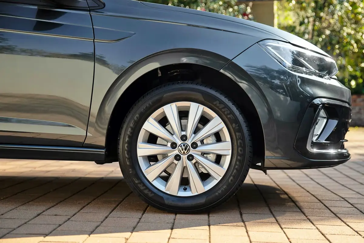 Volkswagen sedan front wheel and body detail